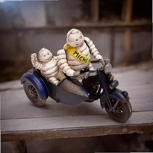 Cast Iron Tire Men on Cycle with Side Car Michelin Figure Antique finish